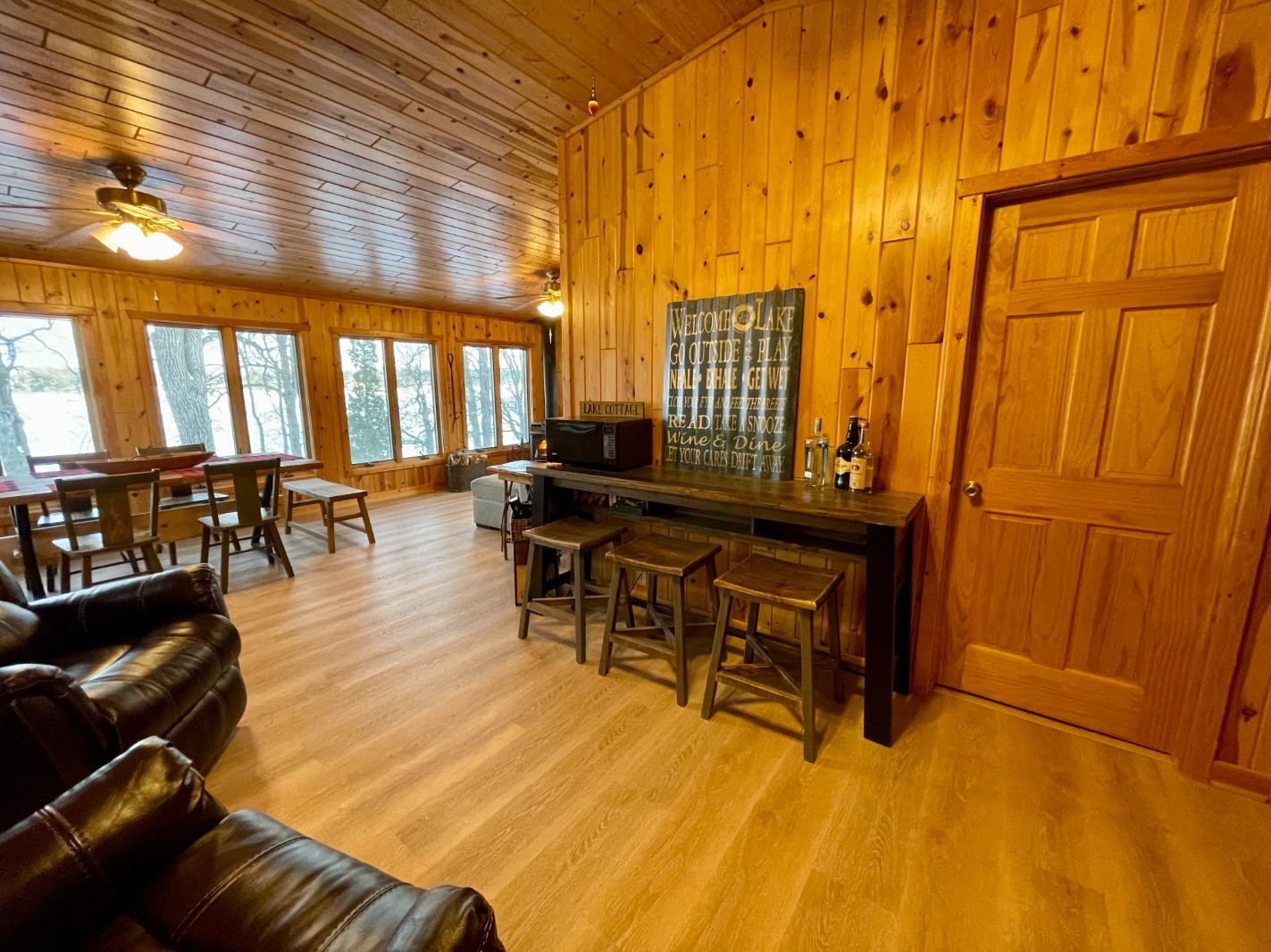 Private beach and dock on Upper Gull Lake at Kamp Christy