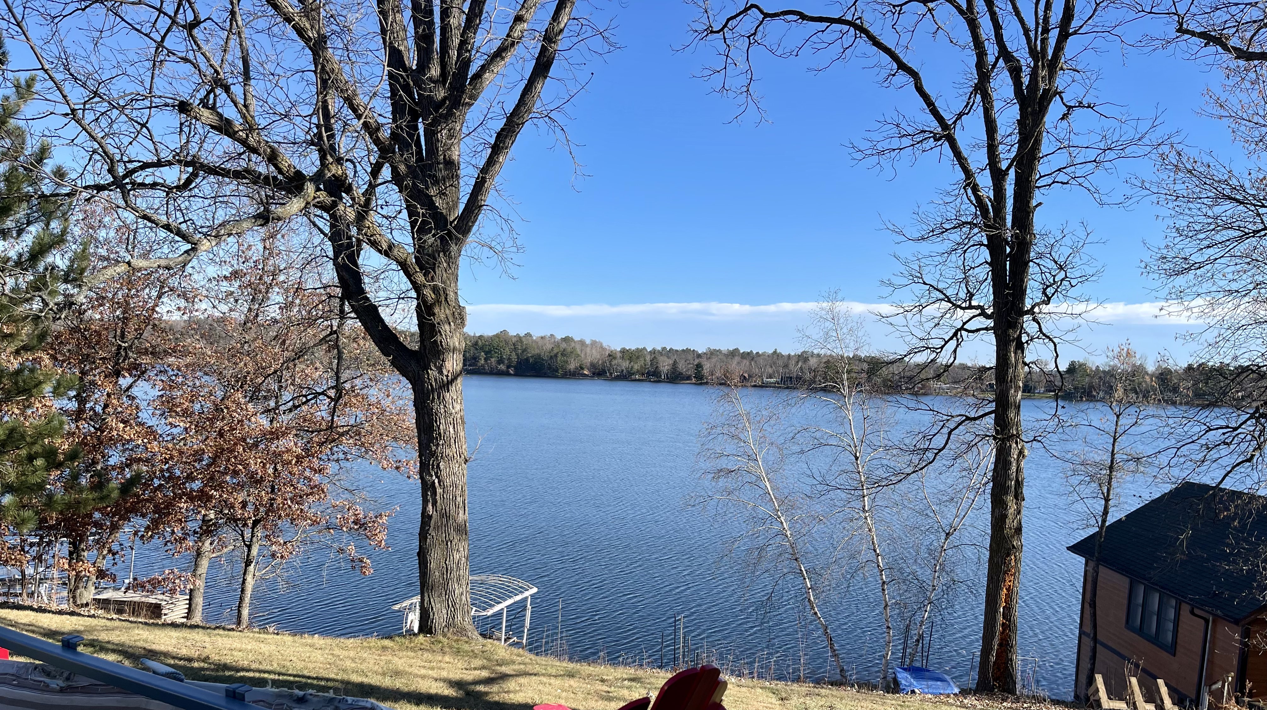 Cabin bedroom with comfortable bedding at Kamp Christy